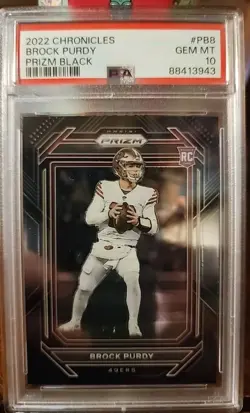 BROCK PURDY PRIZM BLACK ROOKIE PSA 10 2022 PANINI CHRONICLES 49ers - Image 1