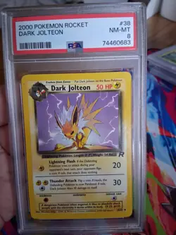 2000 Pokemon Rocket #38 Dark Jolteon PSA 8 NM/MINT Condition - Image 1