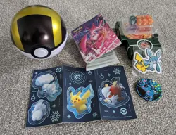 Pokemon Gift Bundle: 50 unique cards (10 foils) mini binder, pokeball, pikachu! - Image 1