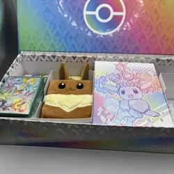 Prismatic Evo SPC Contents! Deckbox, Sleeves, Playmat, Eevee pouch. NO PACKS - Image 1