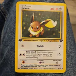 Pokemon TCG Team Rocket 1st Edition Regular Finish Eevee 55/82 NM - Image 1