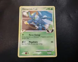 Heracross E4 24/111 Rare Rising Rivals Pokemon Card LP - Image 1