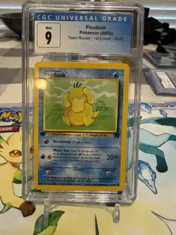 Psyduck Pokemon (2000) Team Rocket - 1st Edition CGC 9 - Image 1