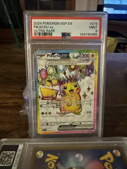 Pokemon TCG Pikachu EX Sv08: Surging Sparks Ultra Rare Card 219/191 PSA 9 - Image 1