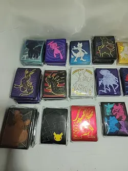 Lot of 29 Assorted Pokemon Sealed ETB Card Sleeves - Image 3