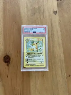 1999 Pokemon Card Raichu Shadowless Holo PSA 5 - Image 1