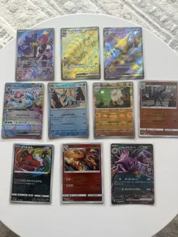 10 Japanese Pokemon Card Lot - EX, GX, Charizard, Alakazam, Eeveelutions - Image 1