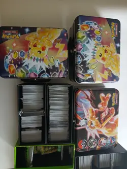 Pokemon Company Pokemon TCG Mixed Card Lot Holo w/ Tins & Boxes Surging Sparks - Image 3