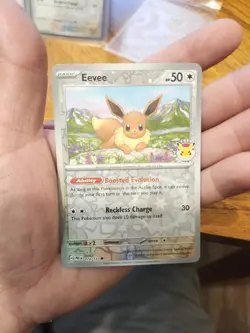 One Eevee 074/131 2025 Pokemon Day Stamped Reverse Holo Cosmos Promo (Perfect) - Image 2