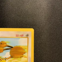 First Edition Doduo 048/102 Base Set (Shadowless) Pokemon Card small crease - Image 3
