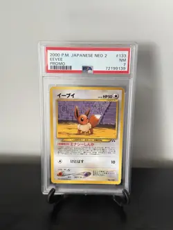 PSA 7 (NM) 2000 Japanese Neo Premium File 2 Promo Eevee No. 133 - Pokemon - Image 1