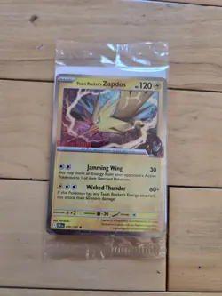 Team Rocket’s Zapdos Pokemon Promo Card - GameStop Exclusive - Holo Rare SEALED! - Image 1