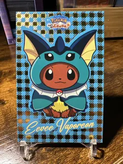 2025 Pokemon Card Database Let’s Go Eevee! Holo Eevee Vaporeon Gold Foil - Image 1