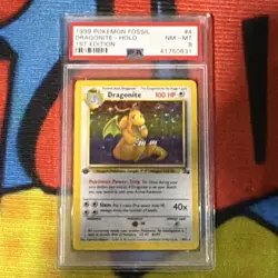 Pokemon TCG Dragonite Fossil 1st Edition Holo Rare 4/62 PSA 8 (1999) - Image 1