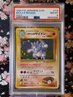 [PSA 7] Brock's Rhydon 112 1998 Gym Heroes Old Back Holo Japanese Pokemon Card - Image 1