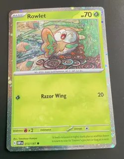 Pokemon TCG Rowlet 013/197 Cosmos Holo Obsidian Flames LP - Image 1