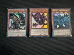 Yu Gi Oh Drago Alato di Ra, Slifer Drago del Cielo, Obelisk il Tormentatore RA05 - Image 1