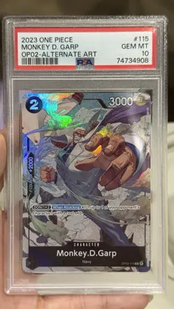 2023 ONE PIECE OP02-PARAMOUNT WAR ALTERNATE ART #115 MONKEY D. GARP PSA 10 - Image 1