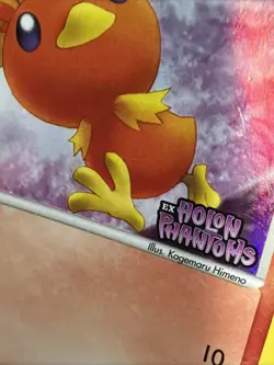 Torchic 83/110 Holon Phantoms Stamped Holo Pokemon Card - Image 3