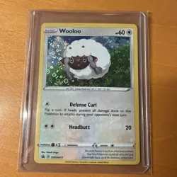 Wooloo SWSH011 SWSH: Sword & Shield Promo Cards Cosmo Holo - Image 1