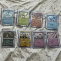 Pokemon Prismatic Evolutions 8 Cosmos Promo Cards - Costco Mini Tin Promos - Image 1