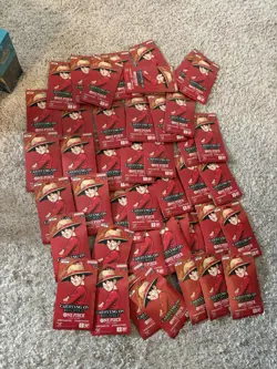 One piece OP-13 Carrying on His Will Sleeved Booster Pack LOT 40 - Image 1