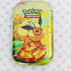 Pokemon TGC Prismatic Evolutions COMPLETELY Empty Mini Tins Flareon - Image 1