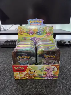 Pokemon Prismatic Evolutions Mini Tin Display Box (8 mini tins) - Image 1
