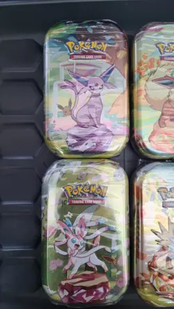 Pokemon Scarlet & Violet Prismatic Evolutions Mini Tins x 6 Artworks - Image 2