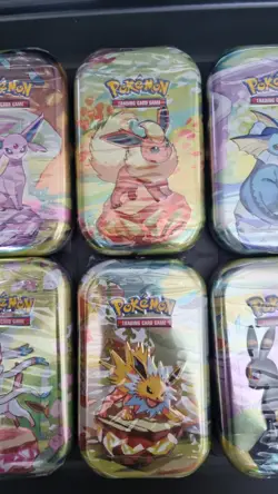 Pokemon Scarlet & Violet Prismatic Evolutions Mini Tins x 6 Artworks - Image 3