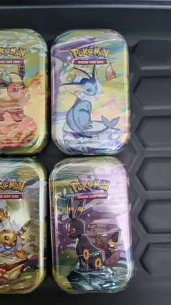 Pokemon Scarlet & Violet Prismatic Evolutions Mini Tins x 6 Artworks - Image 4