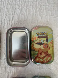 Pokemon Prismatic Evolutions Mini Tin Full Set x8 – Empty Tins+7 Art Cards Coins - Image 3