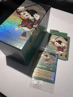 Disney Ravensburger Lorcana Scrooge McDuck Foil Storyborn Hero PROMO & box - Image 1