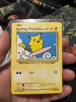 Pokemon Evolutions Surfing Pikachu Card 111/108 Secret Rare, near mint - Image 1