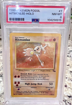 1999 Pokemon Fossil Hitmonlee 7/62 Holo NM-MT Unlimited PSA 8 - Image 1