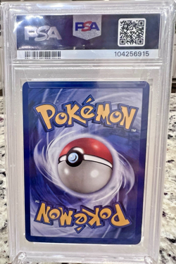 1999 Pokemon Fossil Hitmonlee 7/62 Holo NM-MT Unlimited PSA 8 - Image 2