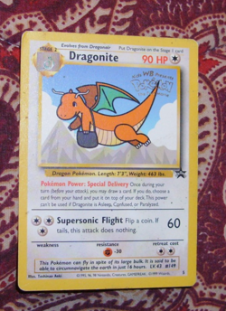 Dragonite 5 WOTC Movie WB Presents Stamped Black Star Promo Pokemon Card - Image 1