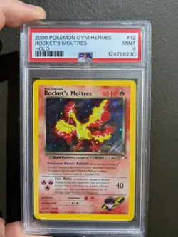 Rocket's Moltres 12/132 Gym Heroes PSA 9 Pokemon Card - Image 1