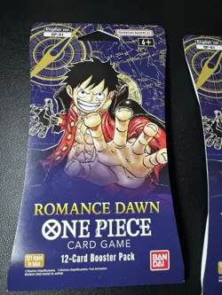 Lot of (2) One Piece English Romance Dawn OP-01 Pre Errata Sleeved Booster Packs - Image 2
