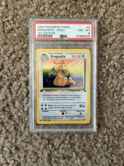 Pokemon PSA 8 Dragonite 4/62 Fossil 1st Edition Holo Rare WOTC 1999 - Image 1
