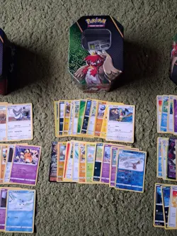 Three Pokemon TCG tins With Random Cards - Image 3