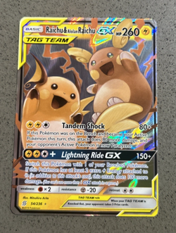 Raichu and Alolan Raichu EX Tag Team Unified Minds Pokemon Card - Image 1