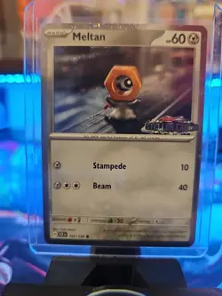 [Stamped] Meltan 102/142 Stellar Crown Stamped Cosmo Foil - Pokemon TCG Promo - Image 2