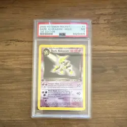 Dark Alakazam Team Rocket 1st Edition Holo #1 (2000) PSA 7 English - Image 1