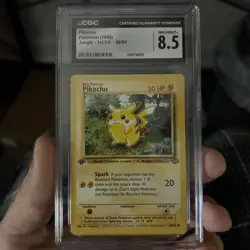 CGC 8.5 Pikachu 1st Edition Jungle 1999 60/64 Pokemon TCG Card - Image 1
