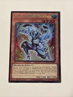 YuGiOh! - Masked HERO Fountain BLGG-EN029 Secret Rare 1st Edition Near Mint - Image 1