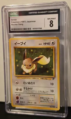 Japanese Pokemon Eevee #133 Team Rocket CGC 8 NM/Mint - Image 2