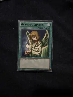 Graceful Charity BP02-EN137 Battle Pack 2: War of the Giants 1st Edition LP - Image 1