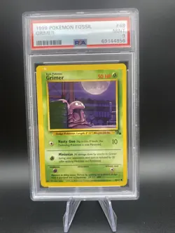 Grimer 48/62 Fossil Set Common Unlimited WOTC Pokemon TCG Mint PSA 9 DOT ERROR - Image 1