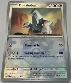 Pokemon Prismatic Evolutions Duraludon Basic #069MBALL Common Reverse Holo - Image 1